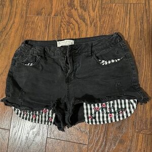 Mid Rise Distressed Jean Shorts with Floral Embroidered Pocket Linings